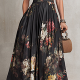Violette | Robe midi en satin plissé noir à imprimé floral et encolure goutte d'eau