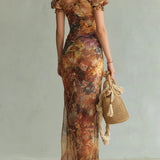 Violette | Robe maxi en mousseline orange à imprimé peinture à l'huile style bohème