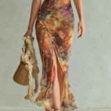 Violette | Robe maxi en mousseline orange à imprimé peinture à l'huile style bohème