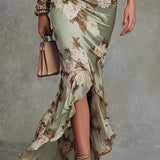 Anne | Robe longue asymétrique en satin vert à col en V, manches bouffantes et imprimé floral